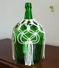 Garrafão verde com pormenor em macramé